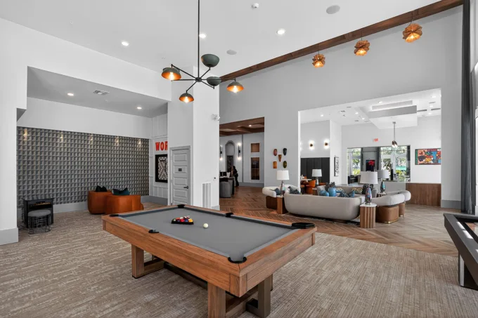 Clubhouse billiards and lounge area at Entrada Apartments, Cape Coral