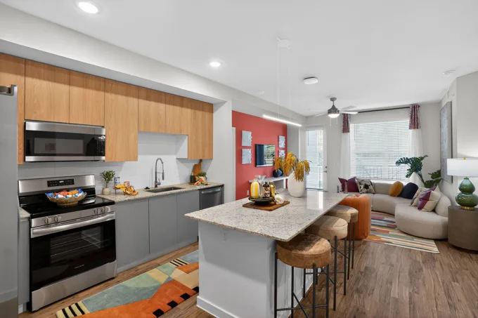 Apartment kitchen with island seating at Entrada Apartments, Cape Coral